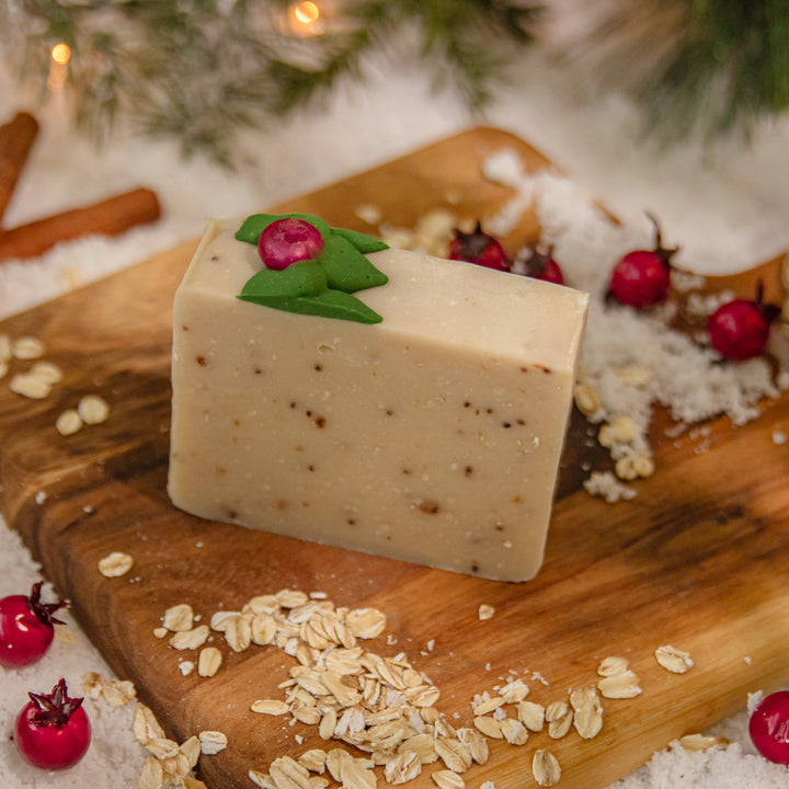 Cranberry Porridge Soap, a handcrafted bar soap. Berry and spicy scent with oatmeal, cranberry seeds and dried cranberries.