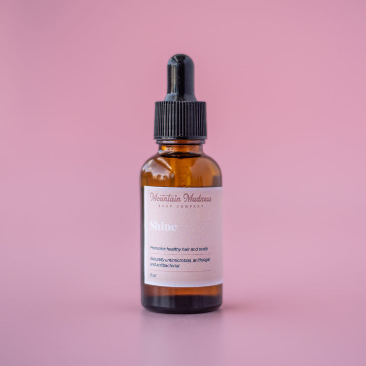 Shine Hair Oil - Jojoba, argan, and moringa handcrafted hair oil in amber glass bottle with dropper