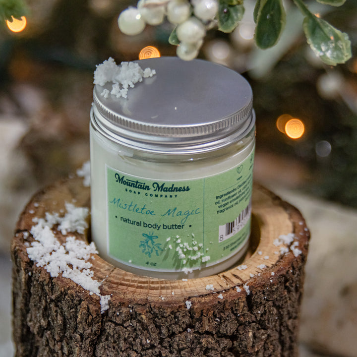 Mistletoe Magic Body Butter, a handcrafted body butter. Berry and fruity scent with shea butter and jojoba oil.
