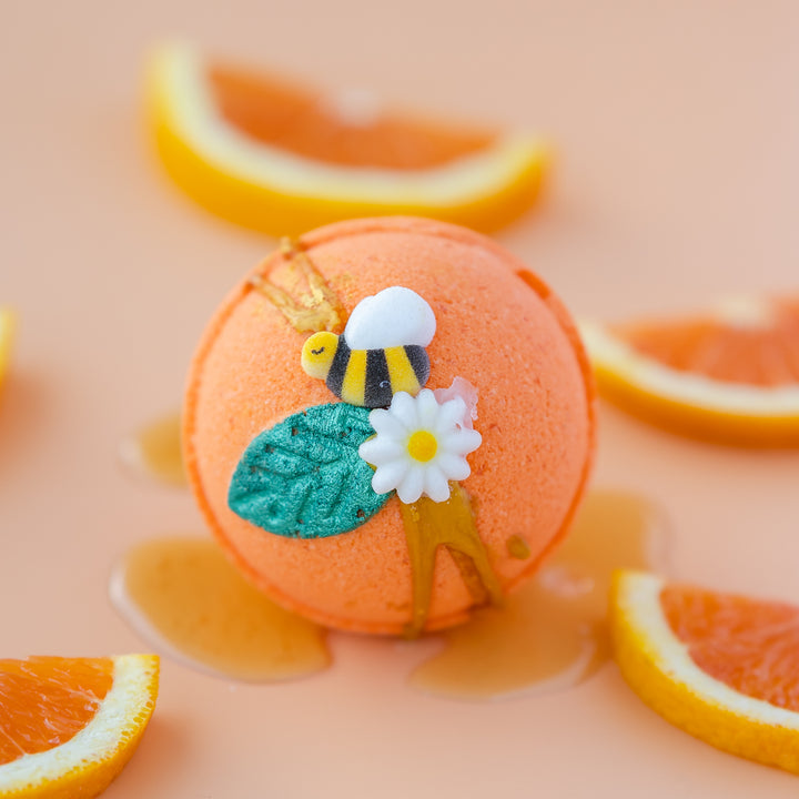 Honey Orange Blossom Bath Bomb, a handcrafted bath bomb. Citrus and foodie scent with cocoa butter and Epsom salt.
