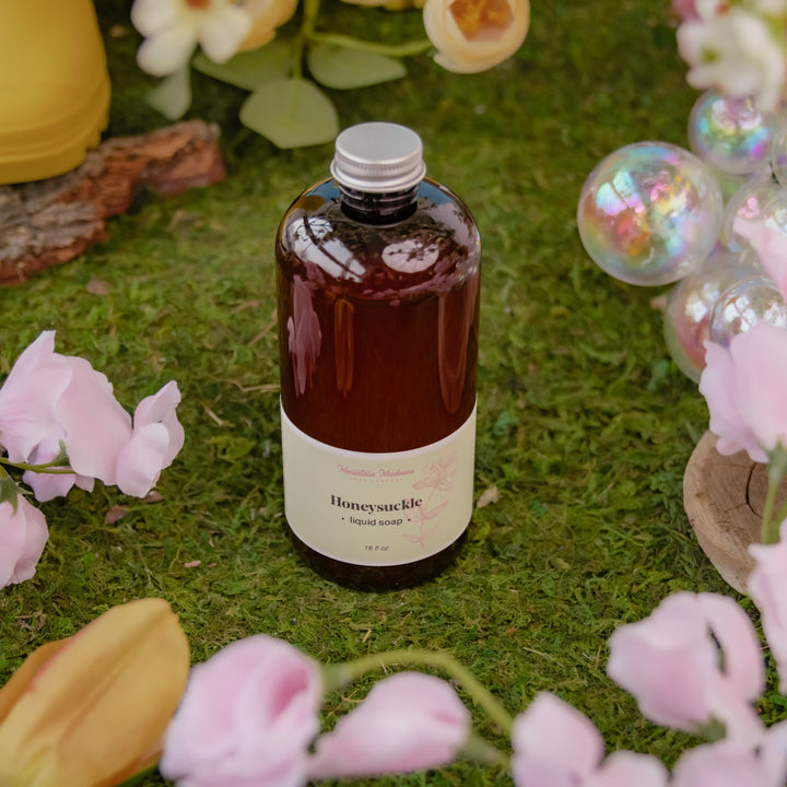Honeysuckle Liquid Soap, a handcrafted liquid soap. Floral scent with coconut oil, olive oil, and jojoba oil.