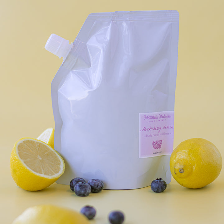 Huckleberry Lemon Body Butter, a handcrafted body butter refill. Berry and citrus scent with shea butter and jojoba oil.