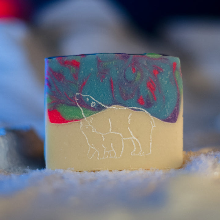 Northern Lights Soap, a handcrafted bar soap. Clean and fresh blend with juniper berry, cedar, lavender, and pear.