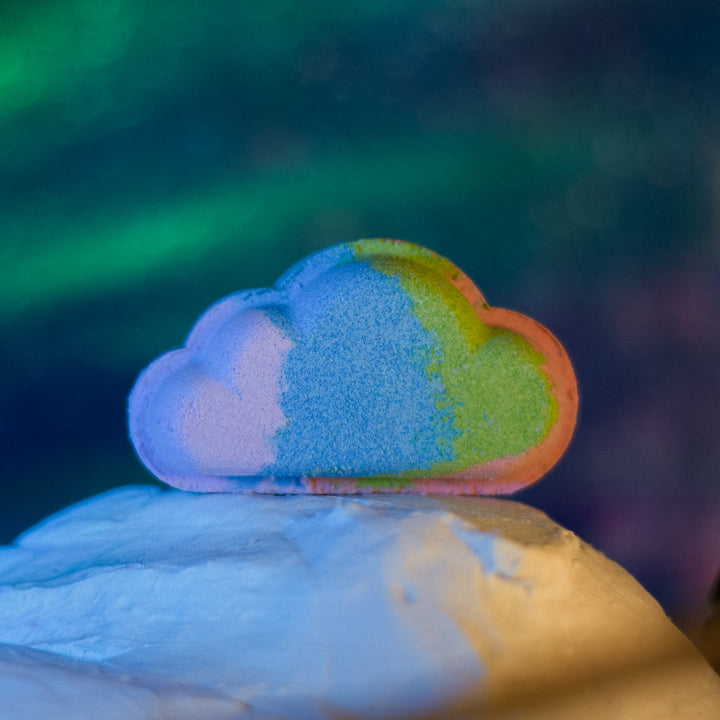 Northern Lights Bath Bomb, a handcrafted bath bomb. Woodsy and fruity scent with juniper berry and cedar.