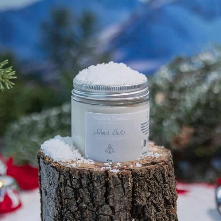 Silver Bells Body Butter, a handcrafted body butter. Spicy citrus and earthy scent with shea butter and jojoba oil.