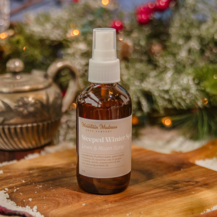 Steeped Winter Spice Linen + Room Spray, a handcrafted room spray. Spicy and herbal with Earl Grey tea and warm spices.